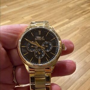 Invicta Gold Watch with Black Dial. 2 available.